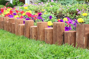 Wooden Full Log Staggered Lawn Edging 3 ft x 7 in (6 Pack) RC47B-6C in use